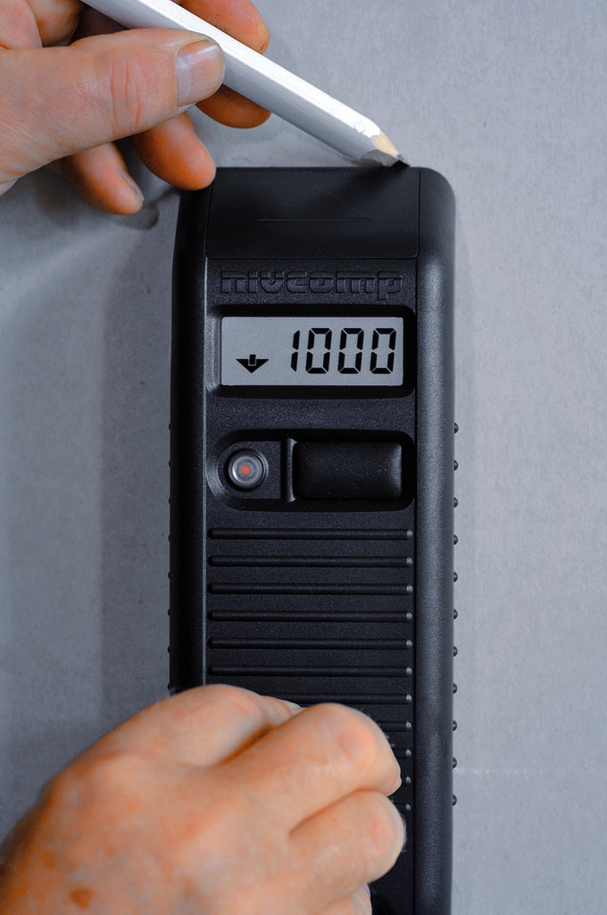 Use the NIVCOMP to mark level indications on walls.